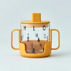 Design Letters Cristalería Infantil|Otra Cristalería<Agarrador para vaso de tritan , Mustard Amarillo