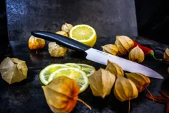 Kyocera Cuchillo de verduras de cerámica FK, 13 cm BlancoNegro Discount